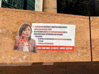 Manifesto contro la presidente dell'Umbria, Donatella Tesei, a Fontivegge