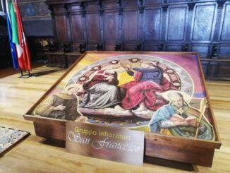 In mostra nella sala dei notari il quadro del gruppo infioratori San Francesco