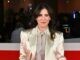 Paola Turci sul red carpet in completo di Brunello Cucinelli